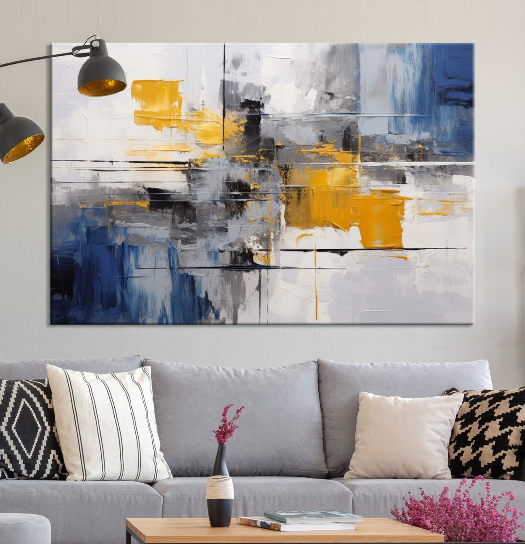 This Large Abstract Contemporary Art Canvas, skillfully crafted by a professional artisan on museum-quality material, showcases shades of blue, yellow, and gray.