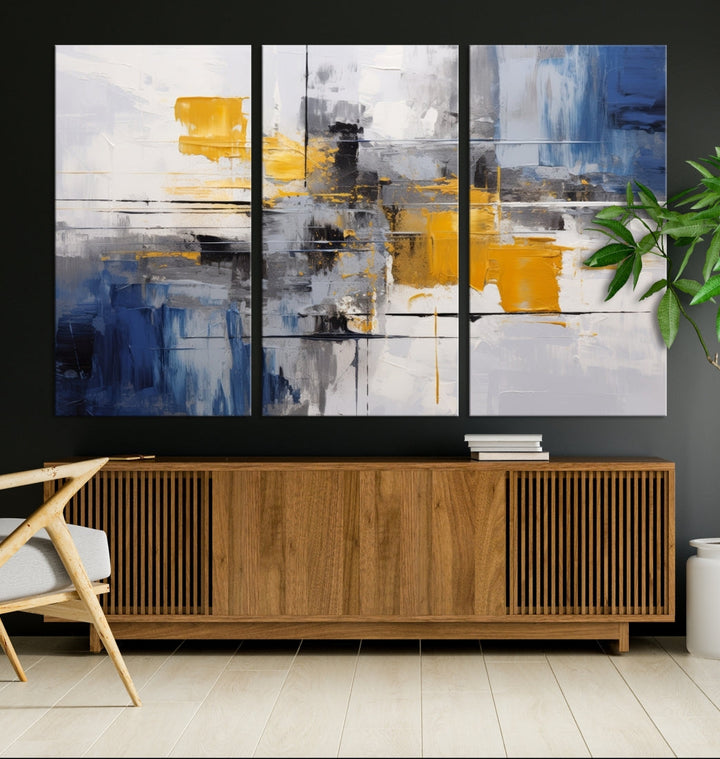 This Large Abstract Contemporary Art Canvas, skillfully crafted by a professional artisan on museum-quality material, showcases shades of blue, yellow, and gray.