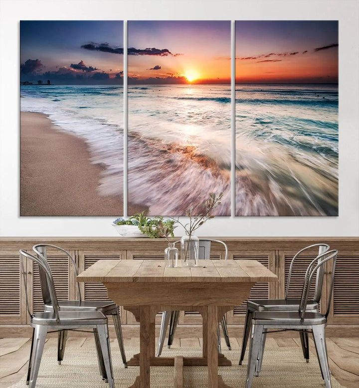 A serene triptych titled "Large Ocean Sunset Canvas Wall Art" features waves gently crashing under a golden reflection. This beach waves art print enhances the room's seaside ambiance.