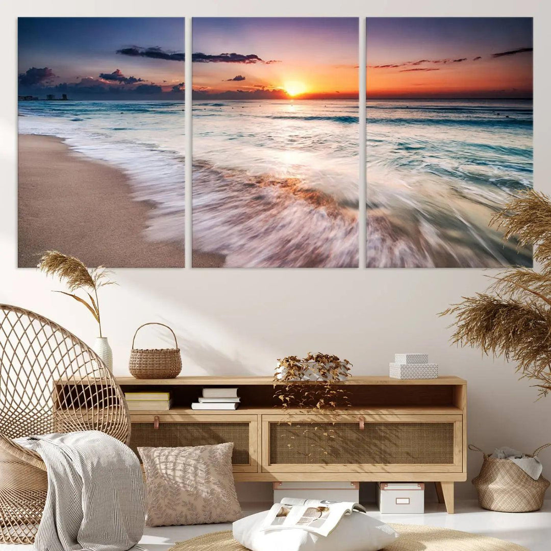 A serene triptych titled "Large Ocean Sunset Canvas Wall Art" features waves gently crashing under a golden reflection. This beach waves art print enhances the room's seaside ambiance.