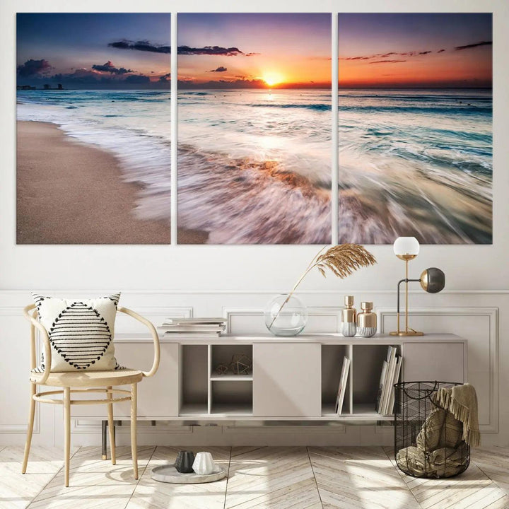 A serene triptych titled "Large Ocean Sunset Canvas Wall Art" features waves gently crashing under a golden reflection. This beach waves art print enhances the room's seaside ambiance.