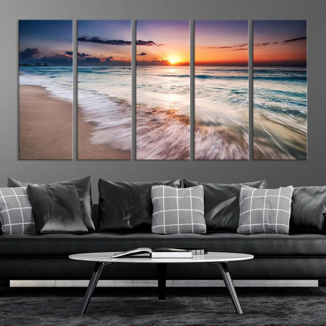 A serene triptych titled "Large Ocean Sunset Canvas Wall Art" features waves gently crashing under a golden reflection. This beach waves art print enhances the room's seaside ambiance.