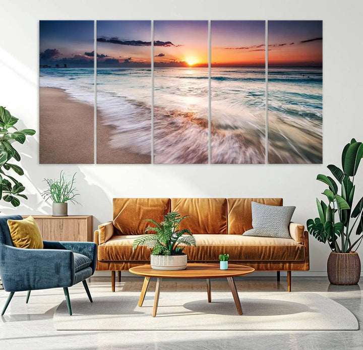 A serene triptych titled "Large Ocean Sunset Canvas Wall Art" features waves gently crashing under a golden reflection. This beach waves art print enhances the room's seaside ambiance.