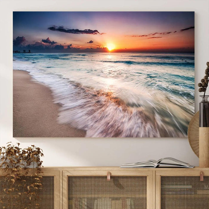 A serene triptych titled "Large Ocean Sunset Canvas Wall Art" features waves gently crashing under a golden reflection. This beach waves art print enhances the room's seaside ambiance.