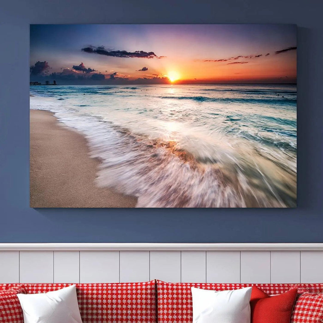 A serene triptych titled "Large Ocean Sunset Canvas Wall Art" features waves gently crashing under a golden reflection. This beach waves art print enhances the room's seaside ambiance.