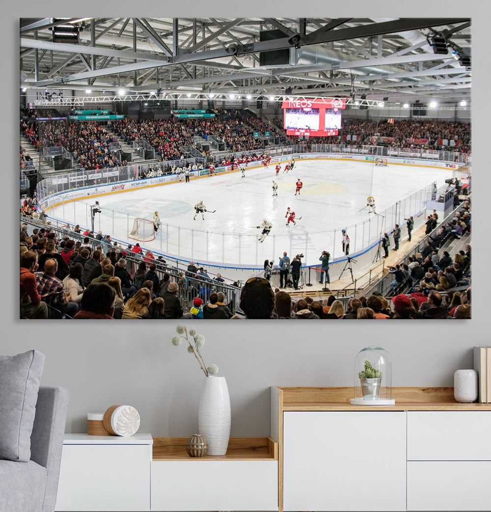 Fans peering through large windows can immerse themselves in a bustling ice hockey rink scene as vividly captured on the museum-quality Lausanne Arena Ice Hockey Stadium Wall Art Canvas Print. The intense energy and excitement of the game are brought to life in this stunning piece.