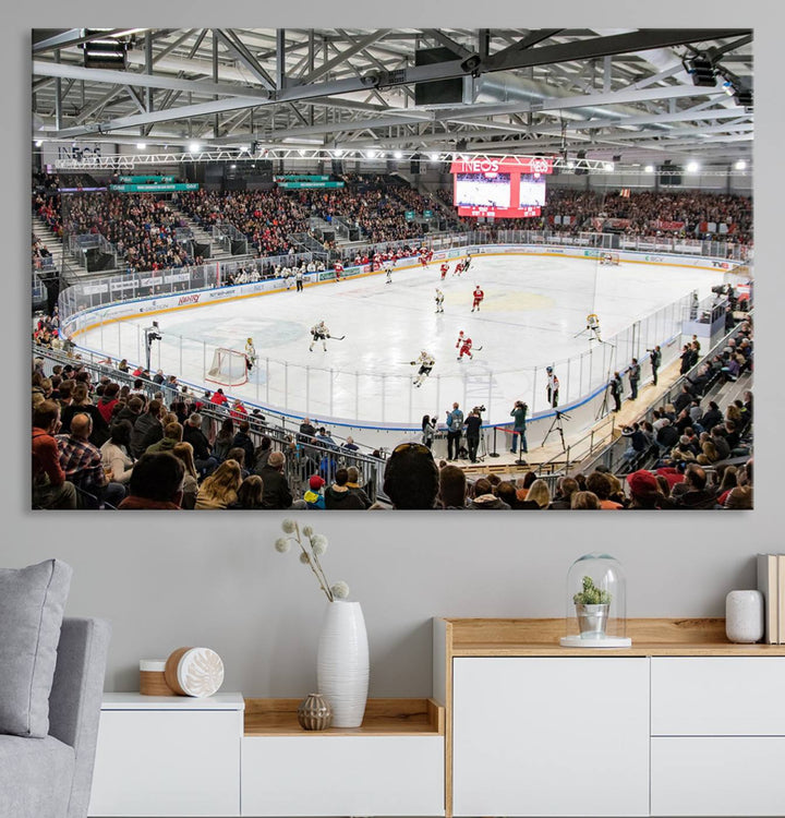 Fans peering through large windows can immerse themselves in a bustling ice hockey rink scene as vividly captured on the museum-quality Lausanne Arena Ice Hockey Stadium Wall Art Canvas Print. The intense energy and excitement of the game are brought to life in this stunning piece.