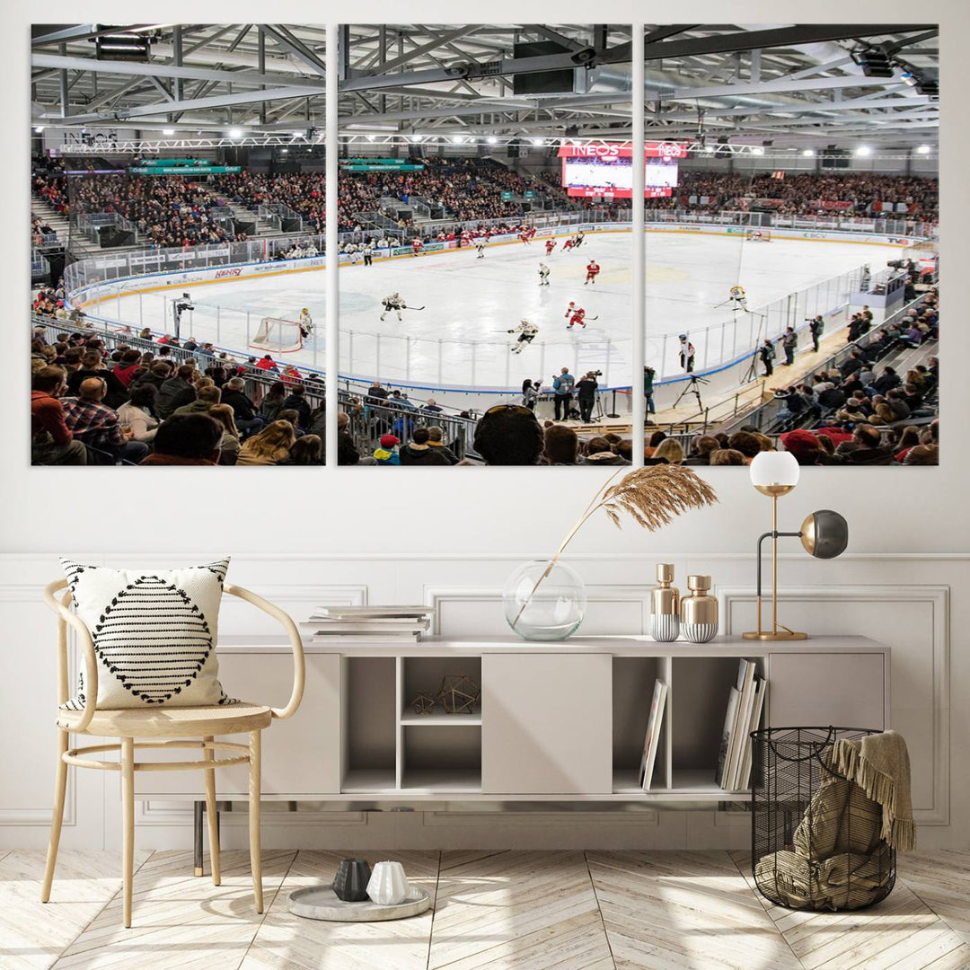 Fans peering through large windows can immerse themselves in a bustling ice hockey rink scene as vividly captured on the museum-quality Lausanne Arena Ice Hockey Stadium Wall Art Canvas Print. The intense energy and excitement of the game are brought to life in this stunning piece.