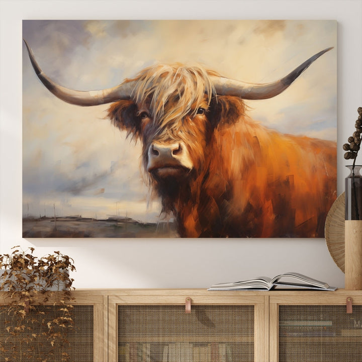 The Longhorn Highland Cow Canvas Wall Art Print, designed in a bold artistic style and perfect for rustic farmhouse decor, adds charm while hanging elegantly on the wall.