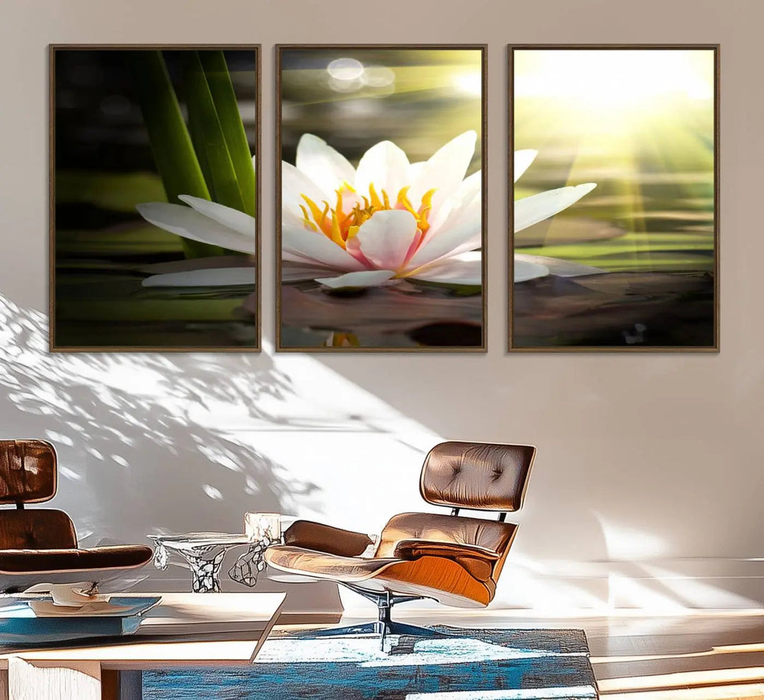 A serene Lotus Flower Wall Art Canvas Print depicts a water lily with sun rays, beautifully displayed on a light-colored wall.