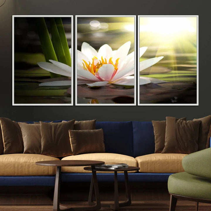 A serene Lotus Flower Wall Art Canvas Print depicts a water lily with sun rays, beautifully displayed on a light-colored wall.