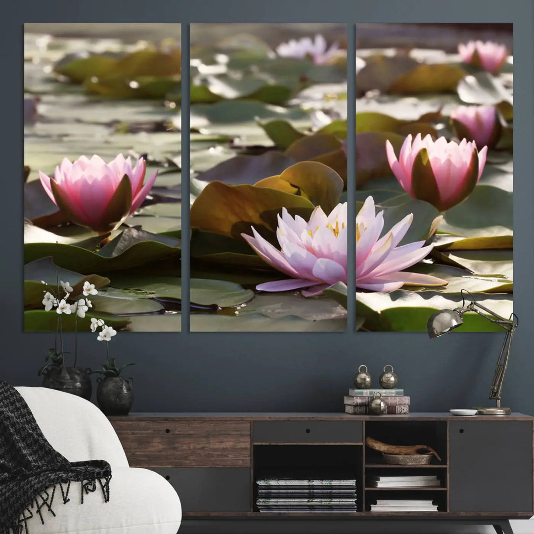 A dining room with a Lotus Flower Wall Art Canvas Print featuring pink water lilies.