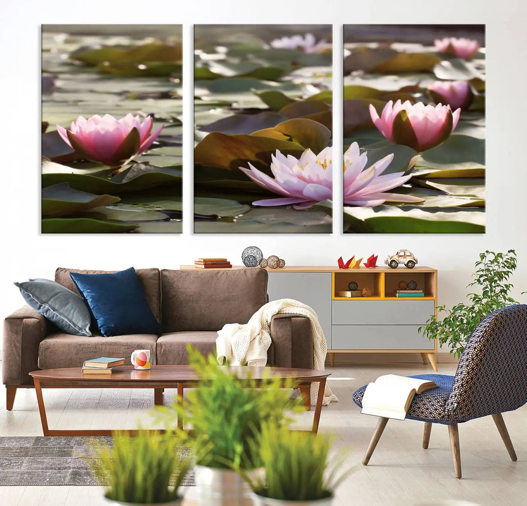 A dining room with a Lotus Flower Wall Art Canvas Print featuring pink water lilies.