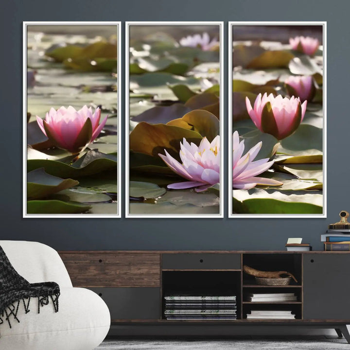 A dining room with a Lotus Flower Wall Art Canvas Print featuring pink water lilies.