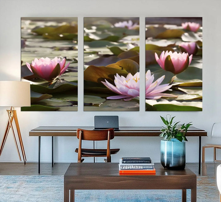 A dining room with a Lotus Flower Wall Art Canvas Print featuring pink water lilies.