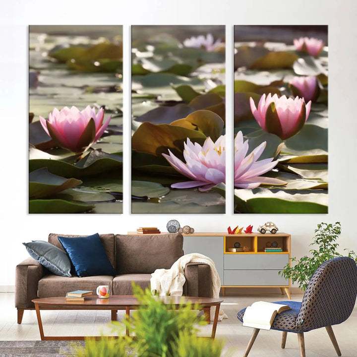 A dining room with a Lotus Flower Wall Art Canvas Print featuring pink water lilies.