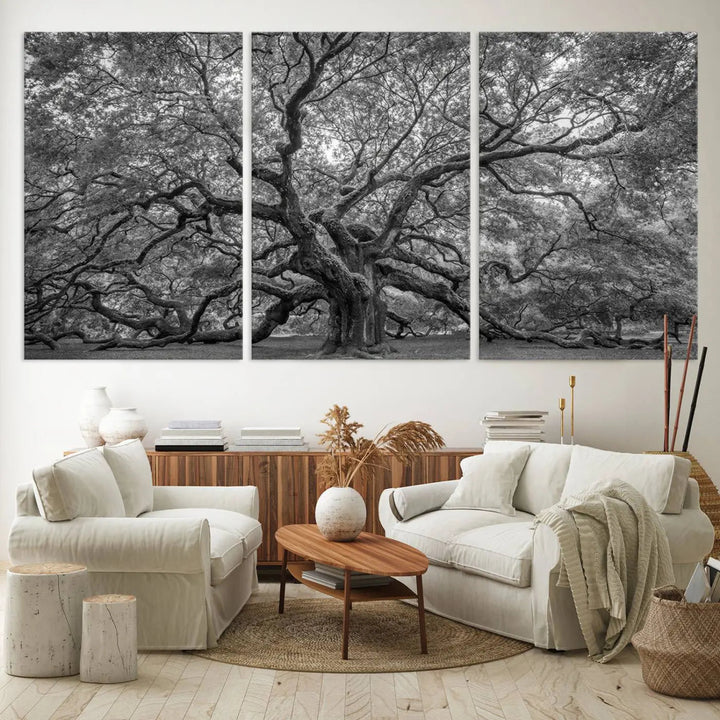 A modern living room highlighted by a striking Majestic Angel Oak Tree Black and White Canvas Print—Multi Panel Wall Art, Giclée Print—adorning the wall.