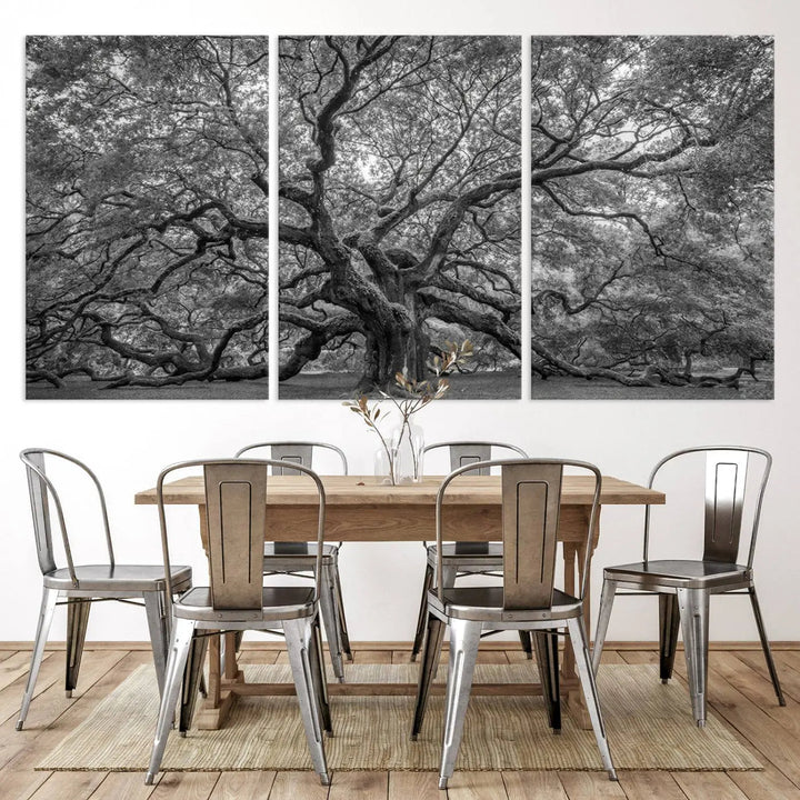 A modern living room highlighted by a striking Majestic Angel Oak Tree Black and White Canvas Print—Multi Panel Wall Art, Giclée Print—adorning the wall.