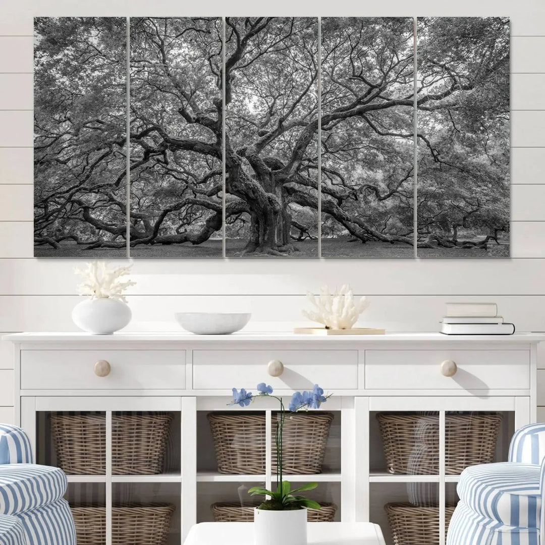 A modern living room highlighted by a striking Majestic Angel Oak Tree Black and White Canvas Print—Multi Panel Wall Art, Giclée Print—adorning the wall.