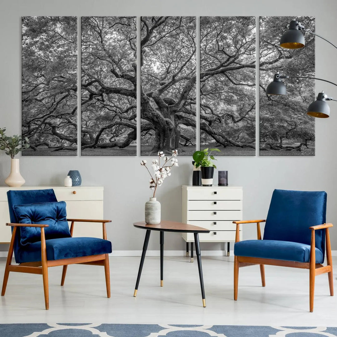 A modern living room highlighted by a striking Majestic Angel Oak Tree Black and White Canvas Print—Multi Panel Wall Art, Giclée Print—adorning the wall.