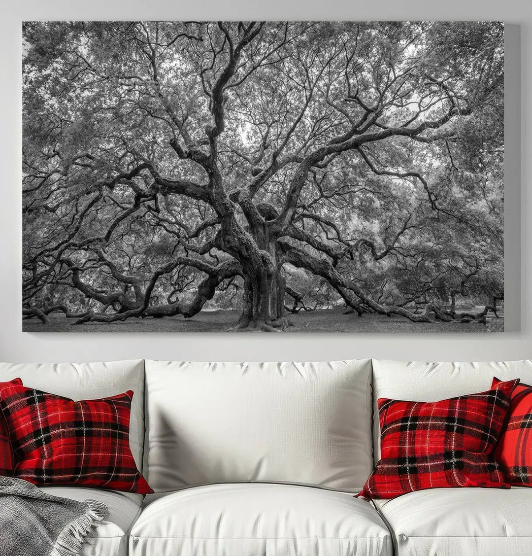 A modern living room highlighted by a striking Majestic Angel Oak Tree Black and White Canvas Print—Multi Panel Wall Art, Giclée Print—adorning the wall.