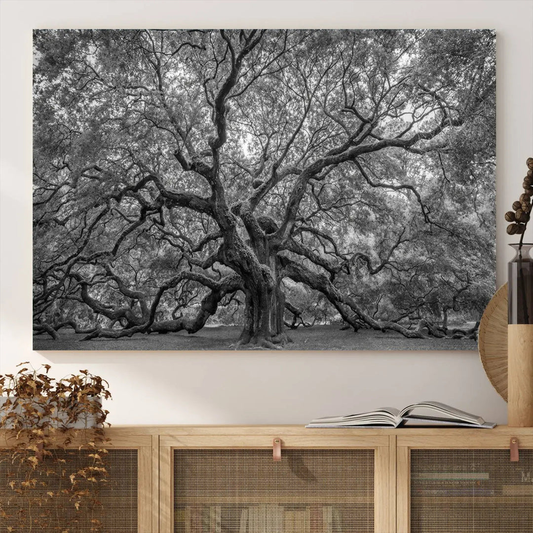 A modern living room highlighted by a striking Majestic Angel Oak Tree Black and White Canvas Print—Multi Panel Wall Art, Giclée Print—adorning the wall.