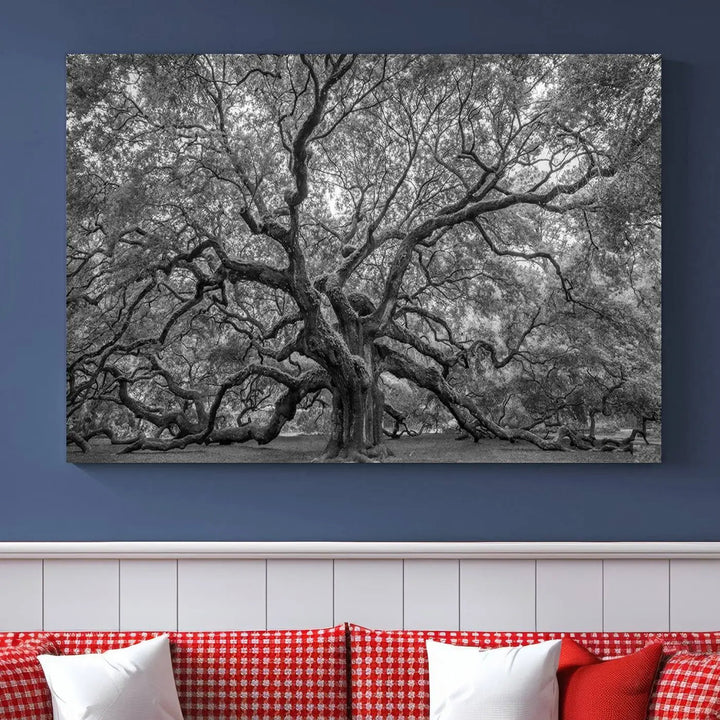 A modern living room highlighted by a striking Majestic Angel Oak Tree Black and White Canvas Print—Multi Panel Wall Art, Giclée Print—adorning the wall.