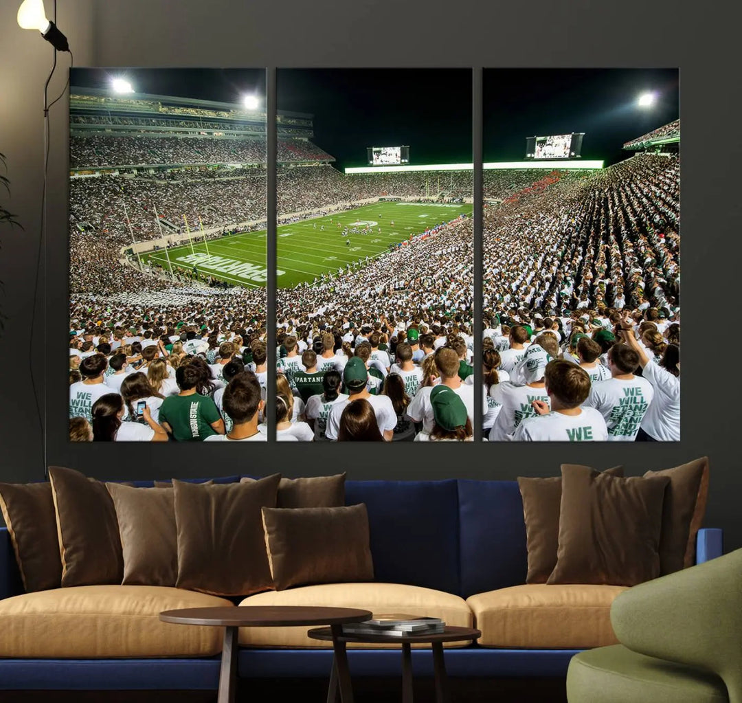 Above the dining table, a gallery-quality Michigan State Spartans Football Team Print on premium canvas is displayed, featuring a panoramic view of East Lansing's Spartan Stadium.