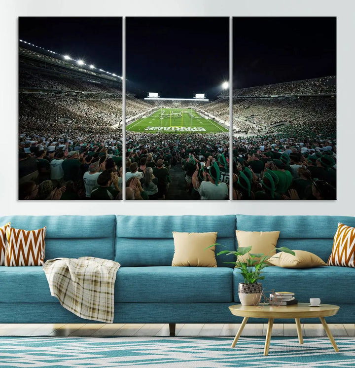 The Michigan State Spartans Football Team Print features an impressive depiction of East Lansing's Spartan Stadium at night, packed with enthusiastic fans. This captivating wall art boasts a gallery-quality finish that enchants any viewer.