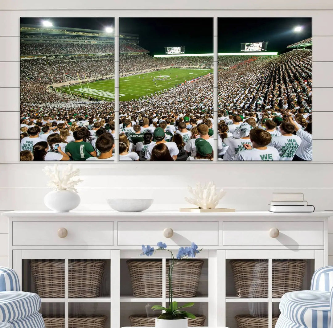 Above the dining table, a gallery-quality Michigan State Spartans Football Team Print on premium canvas is displayed, featuring a panoramic view of East Lansing's Spartan Stadium.