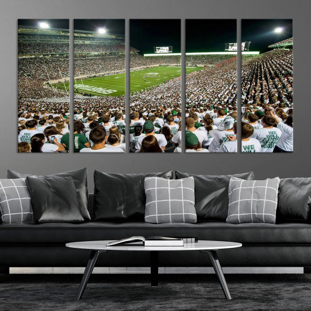 Above the dining table, a gallery-quality Michigan State Spartans Football Team Print on premium canvas is displayed, featuring a panoramic view of East Lansing's Spartan Stadium.