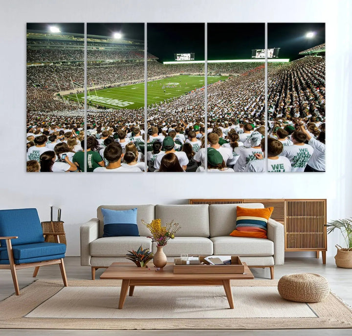 Above the dining table, a gallery-quality Michigan State Spartans Football Team Print on premium canvas is displayed, featuring a panoramic view of East Lansing's Spartan Stadium.