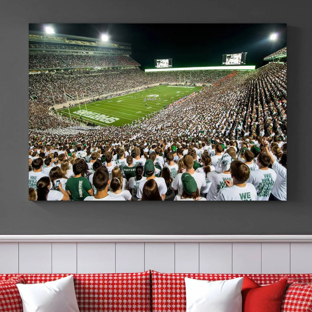 Above the dining table, a gallery-quality Michigan State Spartans Football Team Print on premium canvas is displayed, featuring a panoramic view of East Lansing's Spartan Stadium.