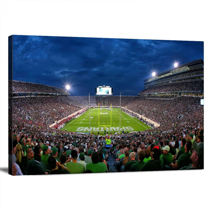 The living room features a Michigan State Spartans Football Team Print, showcasing East Lansing's Spartan Stadium as a triptych wall art above the sofa.