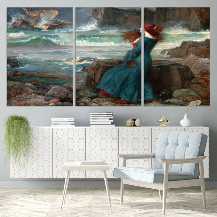 The "Miranda by the Shore Wall Art Canvas Print – Tempest Scene Ocean Storm – Ready to Hang" portrays a woman gazing out at the sea, invoking themes from Shakespeare's "The Tempest," with a shipwreck in the distance.