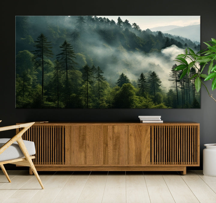 The "Misty Forest Wall Art Premium Canvas Print" enhances the tranquil ambiance of the living room with its portrayal of a foggy and serene atmosphere.