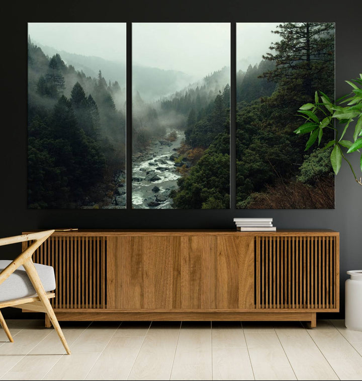 The Misty Forest Wall Art is a ready-to-hang piece showcasing a tranquil nature landscape of a serene river, ideal for your living room or cabin.