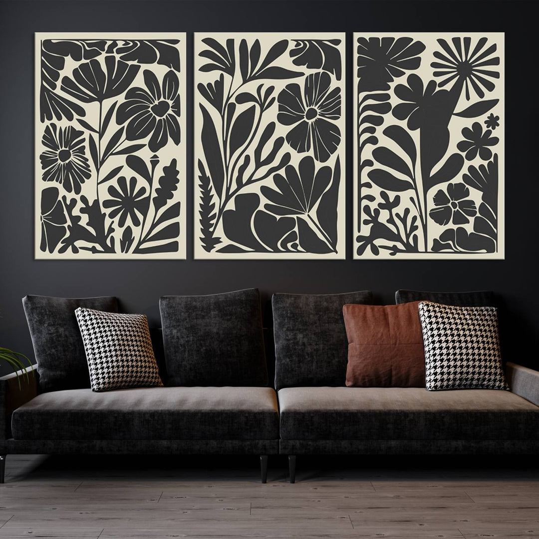 A modern living room features framed black & white botanical wall art that adds flair.