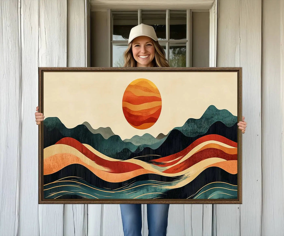 Enhance your contemporary kitchen with the "Mountain Triptych Wall Art - Western Nature Prints." This framed boho canvas depicts an abstract landscape featuring an orange sun rising over stylized mountains and wavy lines, all crafted with a gallery-quality finish for a striking visual impact.