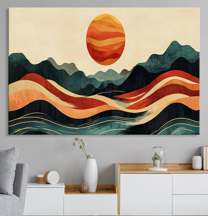 Enhance your contemporary kitchen with the "Mountain Triptych Wall Art - Western Nature Prints." This framed boho canvas depicts an abstract landscape featuring an orange sun rising over stylized mountains and wavy lines, all crafted with a gallery-quality finish for a striking visual impact.