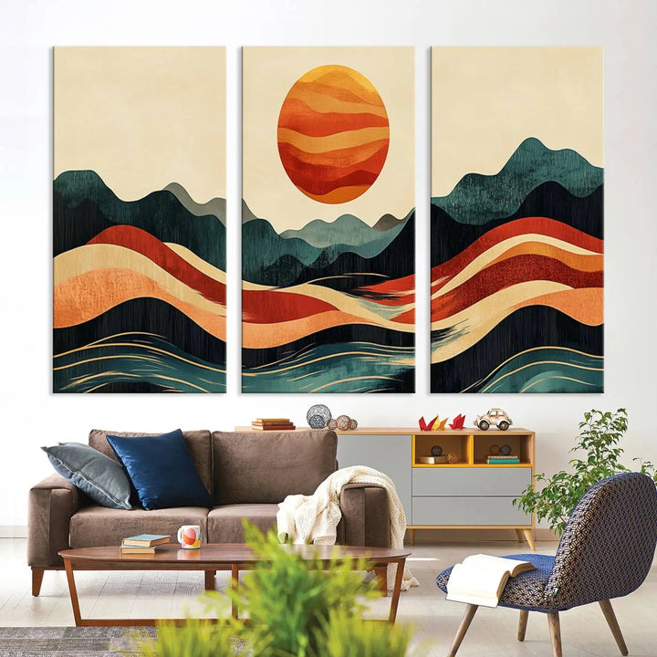 Enhance your contemporary kitchen with the "Mountain Triptych Wall Art - Western Nature Prints." This framed boho canvas depicts an abstract landscape featuring an orange sun rising over stylized mountains and wavy lines, all crafted with a gallery-quality finish for a striking visual impact.