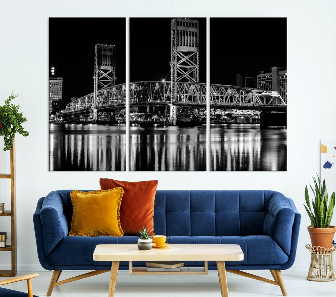 The Jacksonville City Bridge Night Wall Art Canvas Print is a black and white triptych depicting the city bridge at night. It features a UV-protective coating on museum-quality canvas.