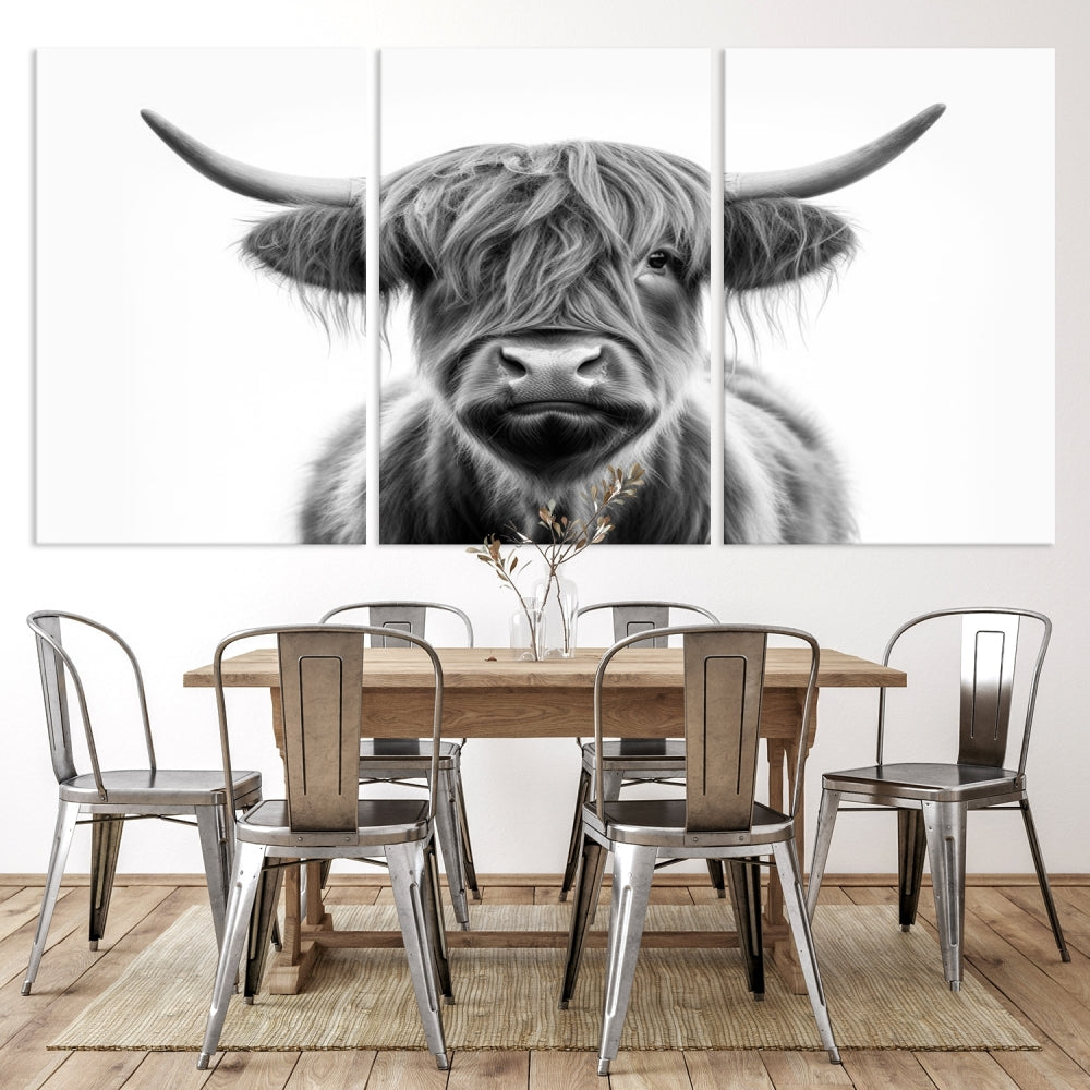 A three-panel wall art from the Highland Cow Animal Canvas series showcases a long-haired, large-horned cow. This Texas Cattle Art Print is crafted on museum-quality canvas with a UV-protective coating, making it an ideal addition to transform your living room.