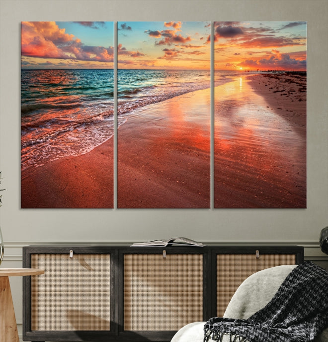 The "Beach and Red Sunset Wall Art Canvas Print" features a triptych of a vibrant beach sunset. These museum-quality canvases come with a UV-protective coating and are ready to hang, offering an instant touch of elegance.