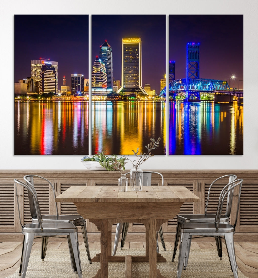 The Jacksonville City cityscape wall art captures a vibrant city skyline at night with colorful reflections in the water and is elegantly displayed on museum-quality gallery wrapped canvas.