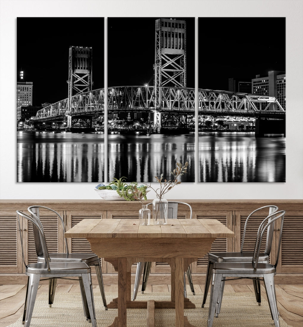 The Jacksonville City Bridge Night Wall Art Canvas Print is a black and white triptych depicting the city bridge at night. It features a UV-protective coating on museum-quality canvas.