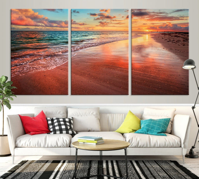 The "Beach and Red Sunset Wall Art Canvas Print" features a triptych of a vibrant beach sunset. These museum-quality canvases come with a UV-protective coating and are ready to hang, offering an instant touch of elegance.