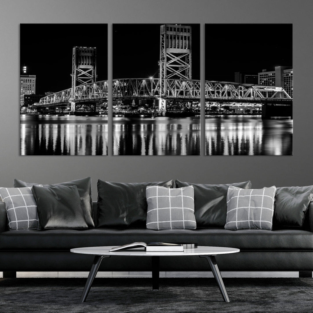 The Jacksonville City Bridge Night Wall Art Canvas Print is a black and white triptych depicting the city bridge at night. It features a UV-protective coating on museum-quality canvas.