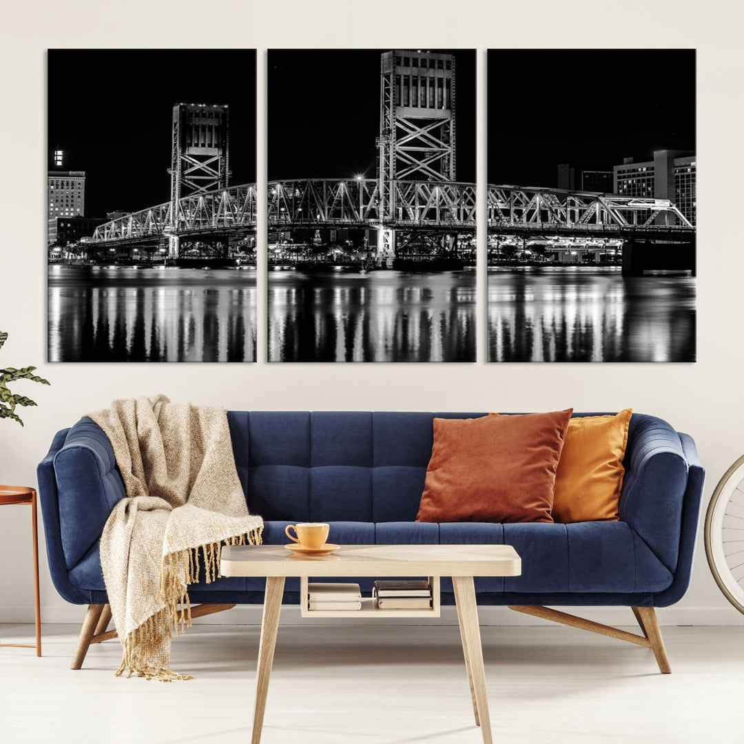 The Jacksonville City Bridge Night Wall Art Canvas Print is a black and white triptych depicting the city bridge at night. It features a UV-protective coating on museum-quality canvas.