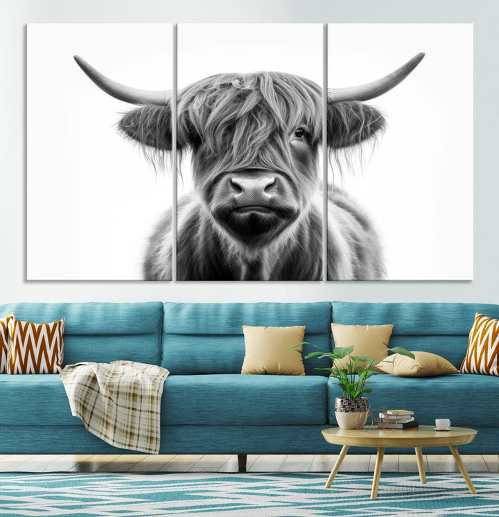 A three-panel wall art from the Highland Cow Animal Canvas series showcases a long-haired, large-horned cow. This Texas Cattle Art Print is crafted on museum-quality canvas with a UV-protective coating, making it an ideal addition to transform your living room.